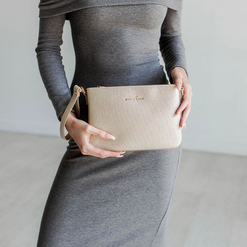 Ara_GoldSparkle_Magenta_Wristlet.jpg