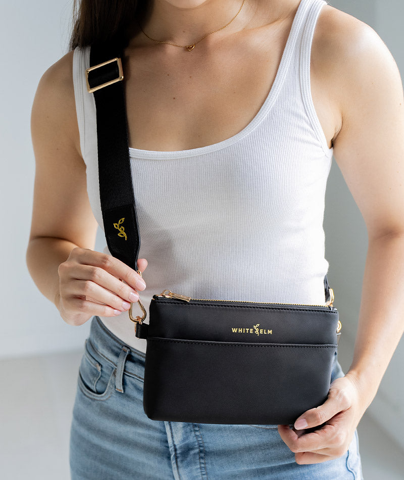 Black Nylon Skye Sling Bag worn crossbody with the adjustable strap