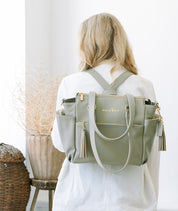 light sage green backpack with pockets and gold hardware gemini mini by white elm