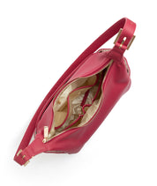Interior lining and pockets inside the Dragon Fruit Camille hobo bag