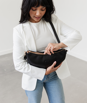 Close-up of the zipper closure on the Black Emily Crescent bag