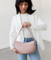 Back panel of the Dusty Rose Emily Crescent bag