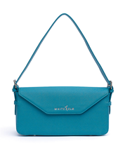 Noemi teal vegan leather east west bag with silver hardware and envelope flap closure