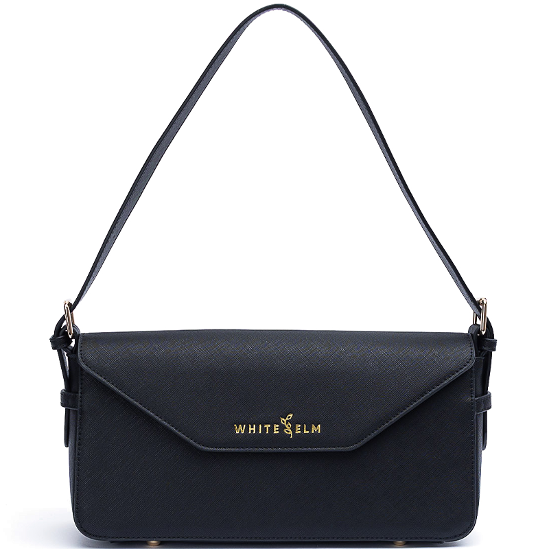 Noemi black vegan leather east west bag with gold hardware and envelope flap closure