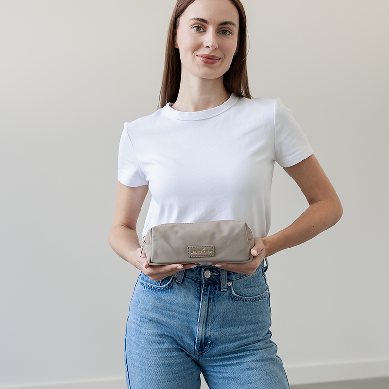 WhiteElm_Penny_Taupe_Holding.png