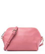 Pink crossbody handbag with a strap by white elm