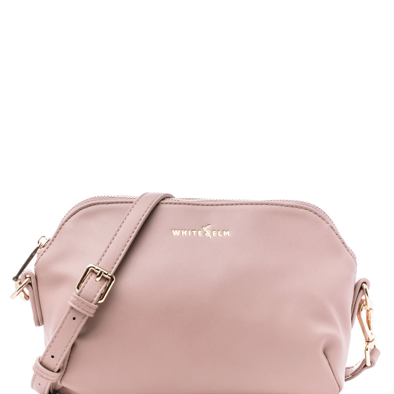 Dusty Rose Rosette Crossbody with premium hardware, studio product shot (gold hardware)