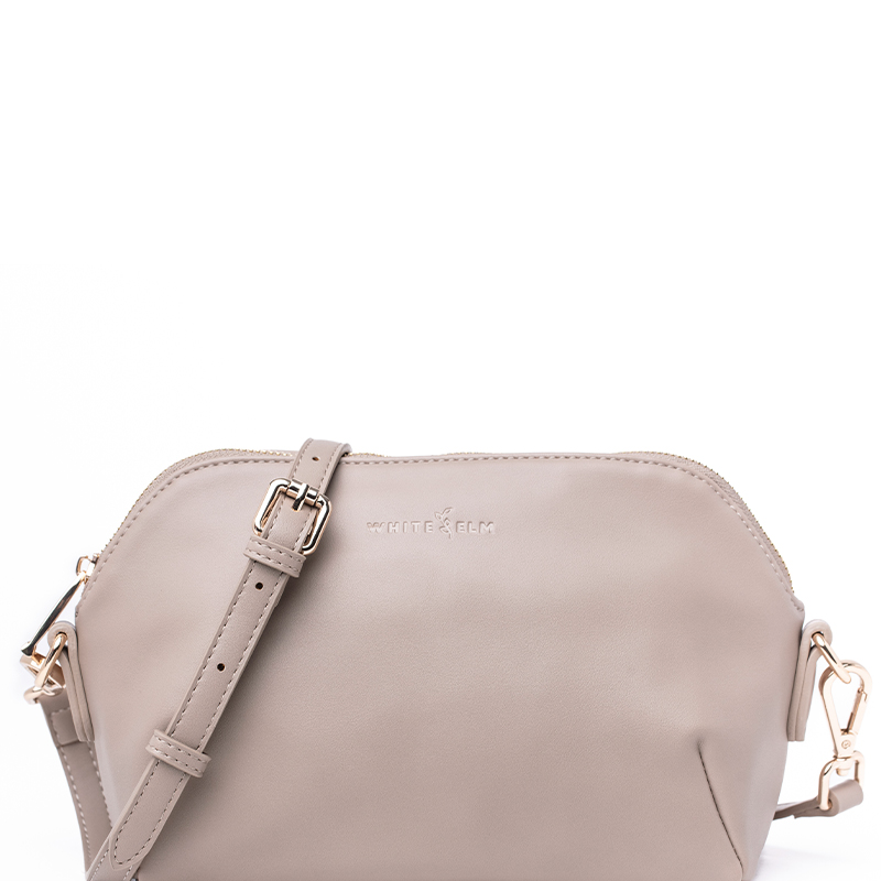 Taupe Rosette Crossbody bag with premium hardware, studio product shot