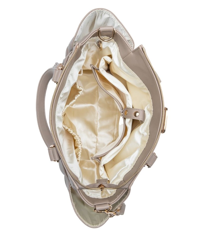 white elm gemini mini backpack open to shimmer cream lining with pockets